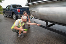 DNR doing an AIS roadside check of watercraft