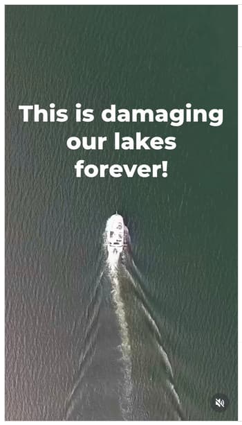 Overhead shot of wake surfing boat moving from bottom to the top of the frame